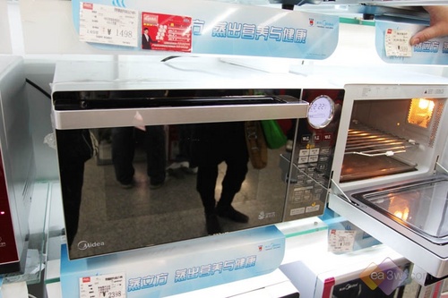 待机功率仅1W!美的微波炉力挫高端